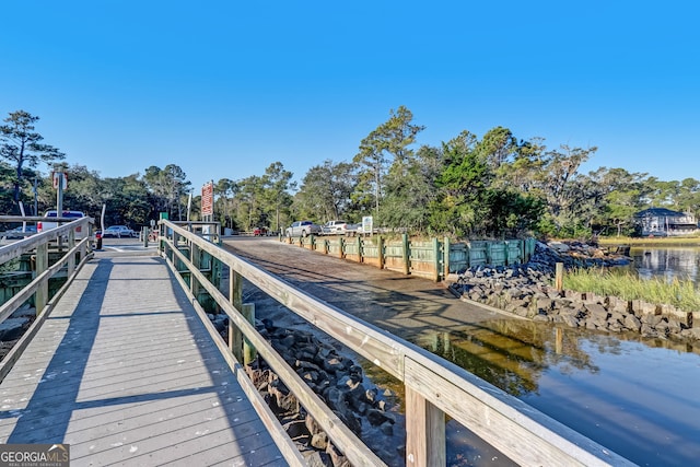 view of dock with a water view