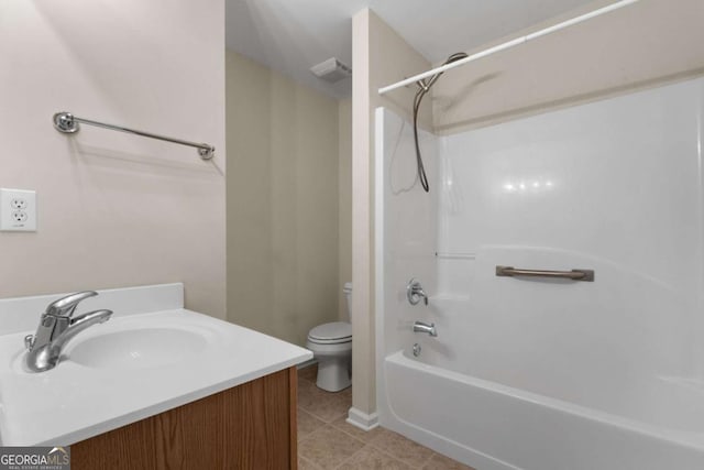 full bathroom with tile patterned flooring, vanity, toilet, tub / shower combination, and visible vents