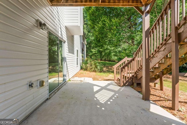 view of patio / terrace featuring stairway