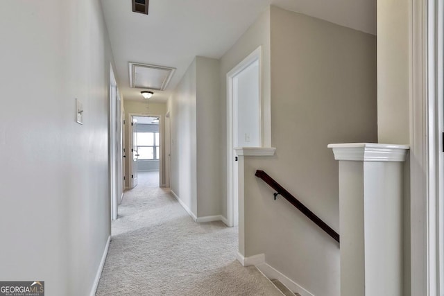 hallway with light carpet