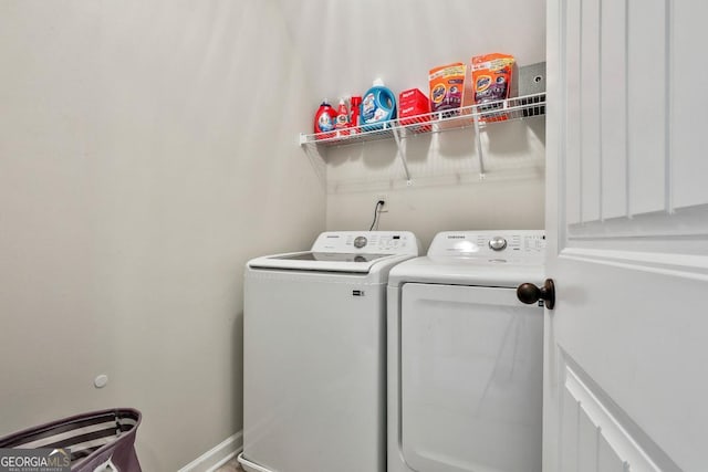 laundry area featuring washer and clothes dryer