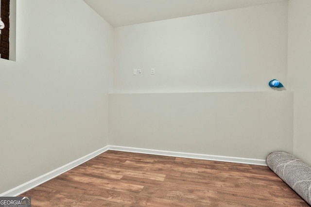 unfurnished room featuring wood-type flooring