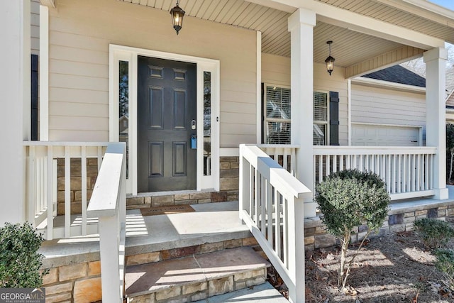 entrance to property with covered porch