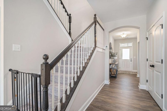 entrance foyer with dark hardwood / wood-style flooring