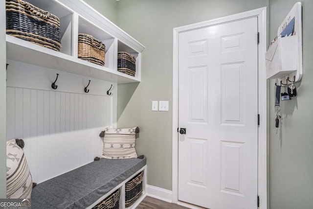 mudroom with dark wood-type flooring