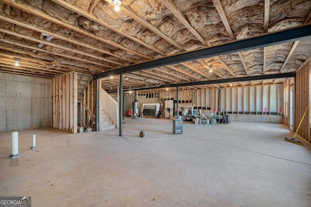 basement featuring water heater