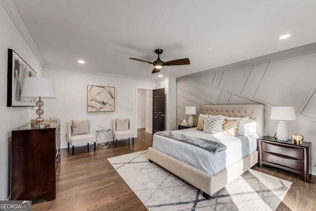 bedroom featuring ceiling fan, dark wood-type flooring, and ornamental molding