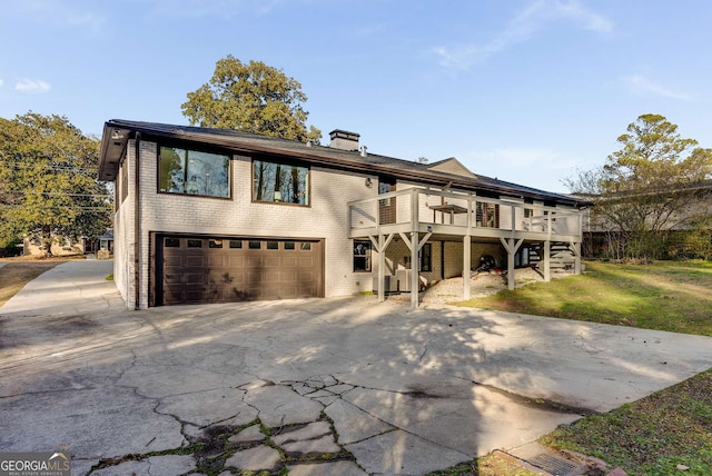 view of front facade featuring a deck and a garage