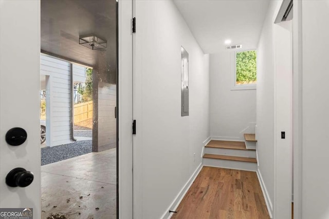 hall with light hardwood / wood-style floors