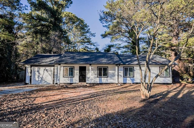 single story home with a garage