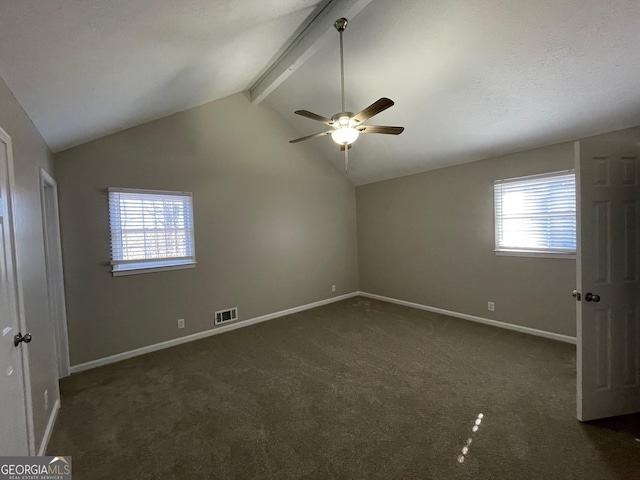 carpeted spare room with vaulted ceiling with beams and ceiling fan