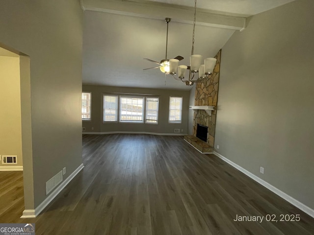 unfurnished living room with beam ceiling, dark wood-type flooring, high vaulted ceiling, a fireplace, and ceiling fan with notable chandelier