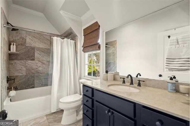 full bathroom featuring crown molding, shower / bath combo with shower curtain, vanity, and toilet