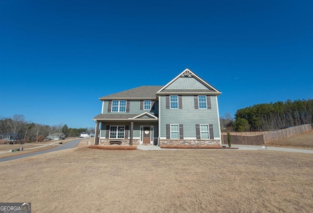 view of front of property with a front lawn