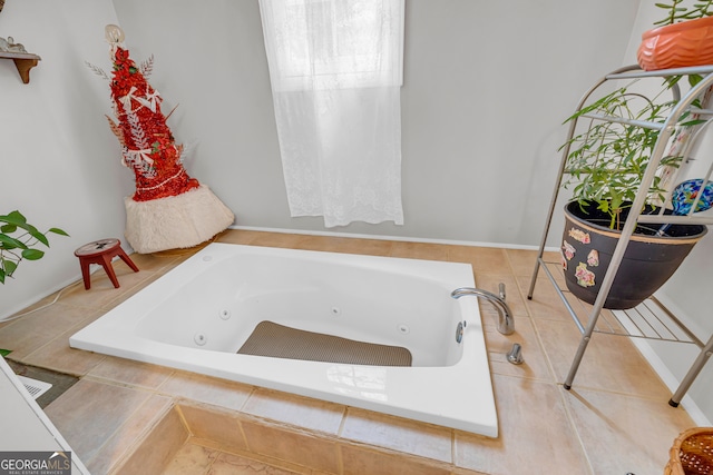 bathroom featuring tiled bath