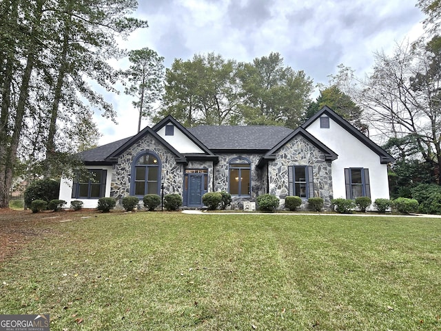 view of front facade with a front yard