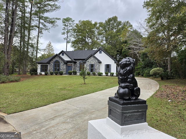 view of front of home with a front yard