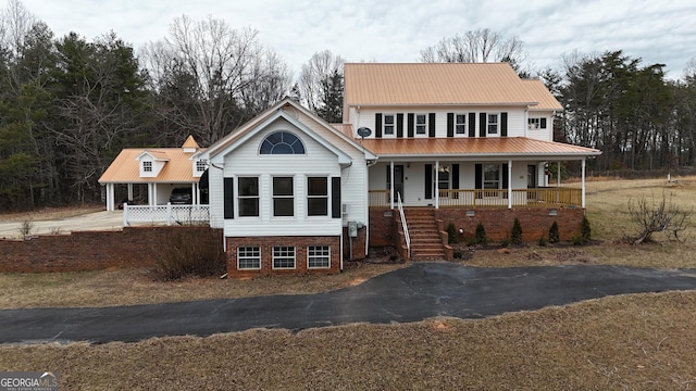 view of front of home featuring covered porch