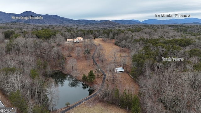 aerial view with a water and mountain view