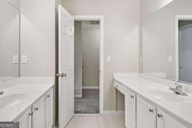 bathroom featuring tile patterned floors and vanity