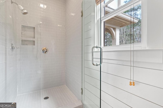 bathroom featuring a stall shower