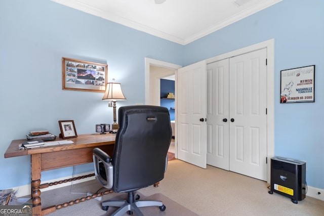 office area featuring crown molding and light carpet