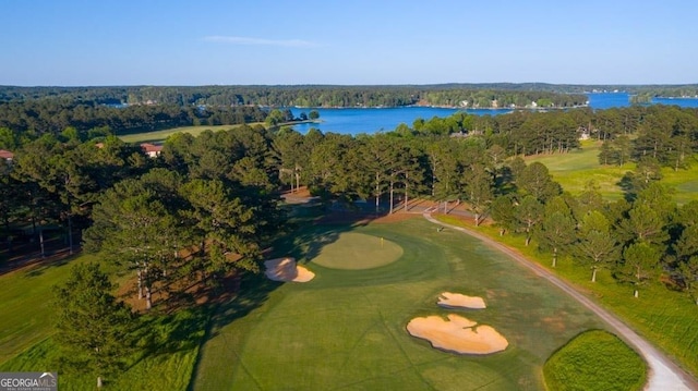 aerial view featuring view of golf course and a water view