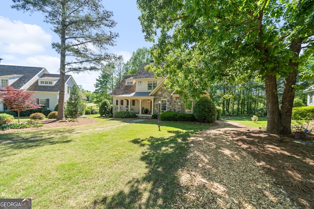 view of yard with a porch
