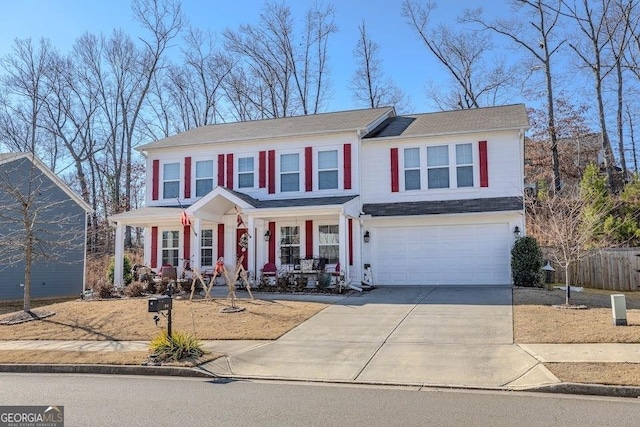 view of front of house with a porch and a garage