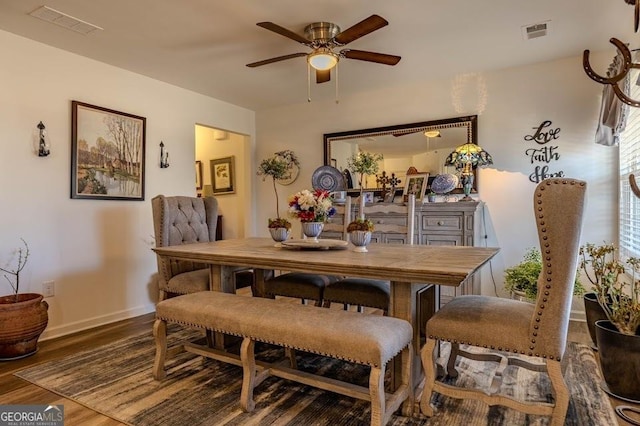 dining room featuring hardwood / wood-style floors and ceiling fan