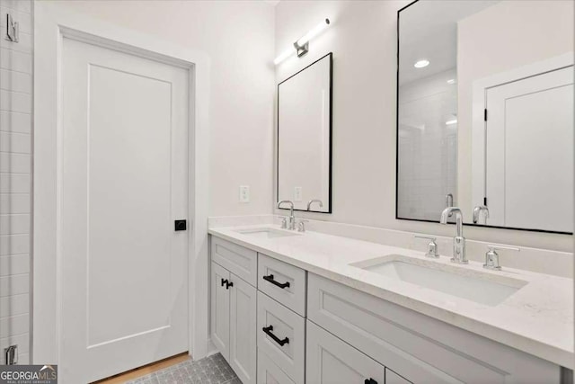 bathroom featuring vanity and walk in shower