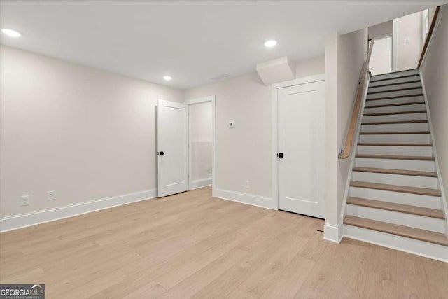 basement with light wood-type flooring