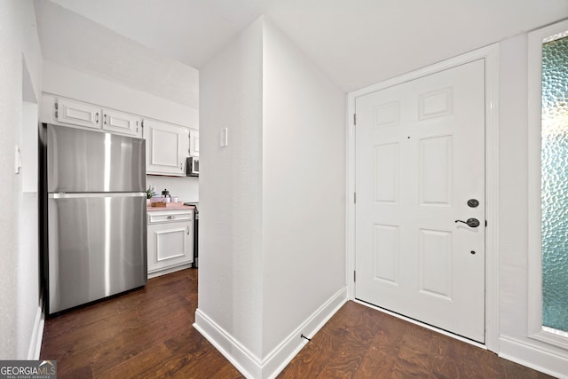 interior space with dark hardwood / wood-style flooring