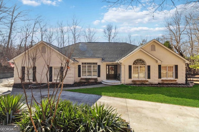 ranch-style house with a front yard