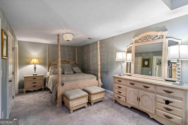 dining space featuring ornamental molding, ceiling fan, light colored carpet, and a tray ceiling