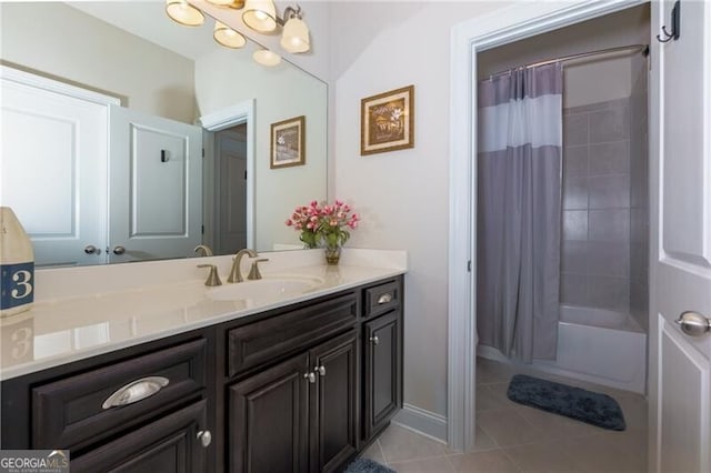 bathroom with shower / bath combo, vanity, and tile patterned floors