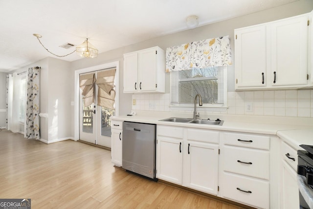 kitchen with white cabinets, light hardwood / wood-style floors, sink, and stainless steel appliances