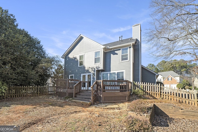 back of property featuring a deck