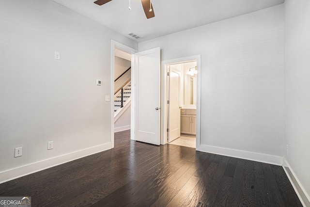 unfurnished room with hardwood / wood-style floors and ceiling fan