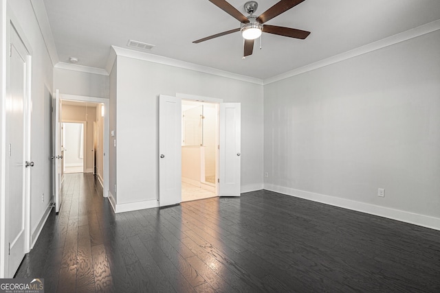 unfurnished bedroom featuring ceiling fan, dark hardwood / wood-style flooring, ornamental molding, and ensuite bathroom