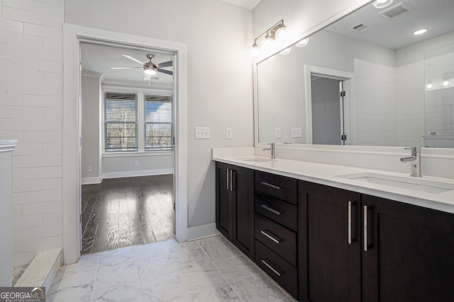 bathroom featuring vanity and ceiling fan