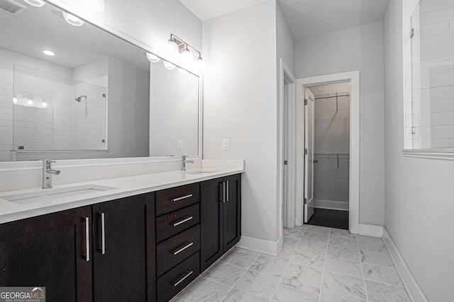 bathroom with vanity and an enclosed shower