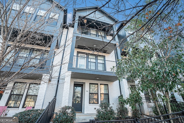 view of front of home with a balcony