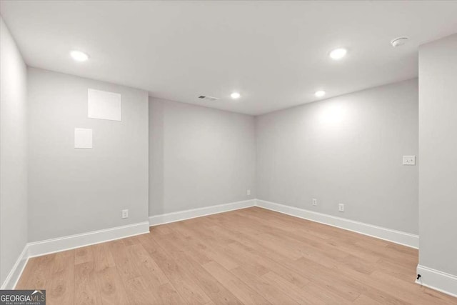 unfurnished room featuring light hardwood / wood-style flooring