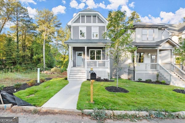 view of front of property featuring a porch and a front yard