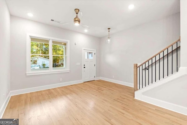 foyer featuring light hardwood / wood-style floors and ceiling fan