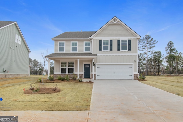 craftsman inspired home featuring a garage and a front yard