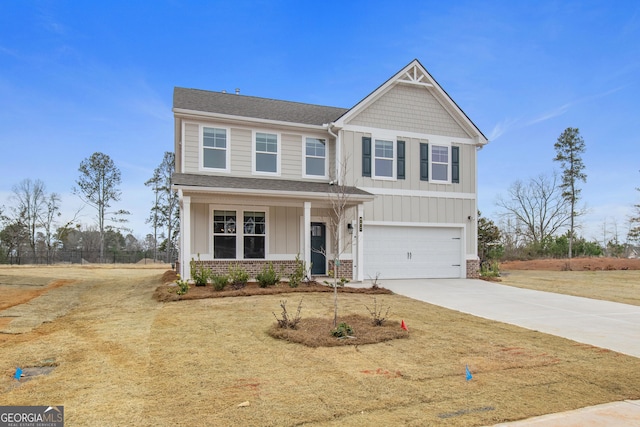 craftsman-style house featuring a front yard and a garage