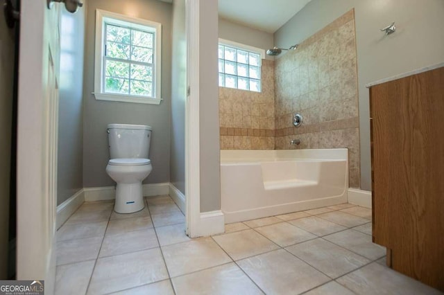 bathroom with tile patterned floors and toilet