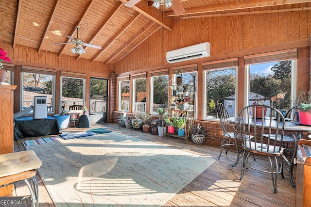 sunroom featuring wood ceiling, a wall unit AC, ceiling fan, and lofted ceiling with beams